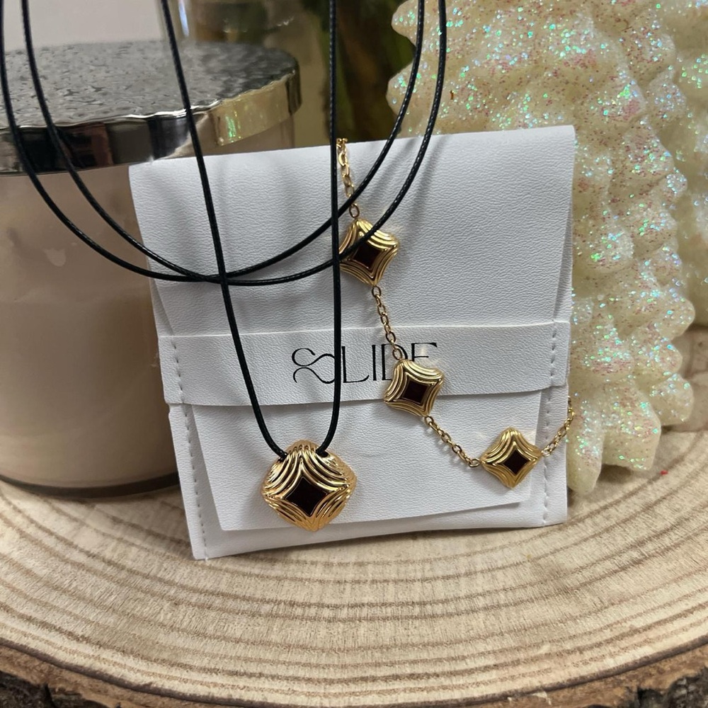 Gold and Black Jewelry Set by